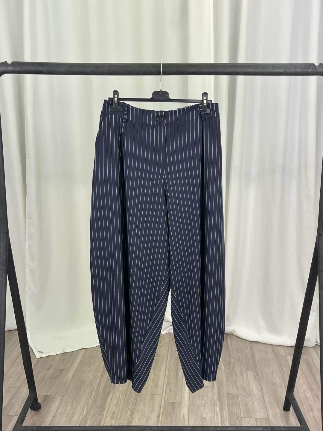 Wide-Leg Pleated Trousers