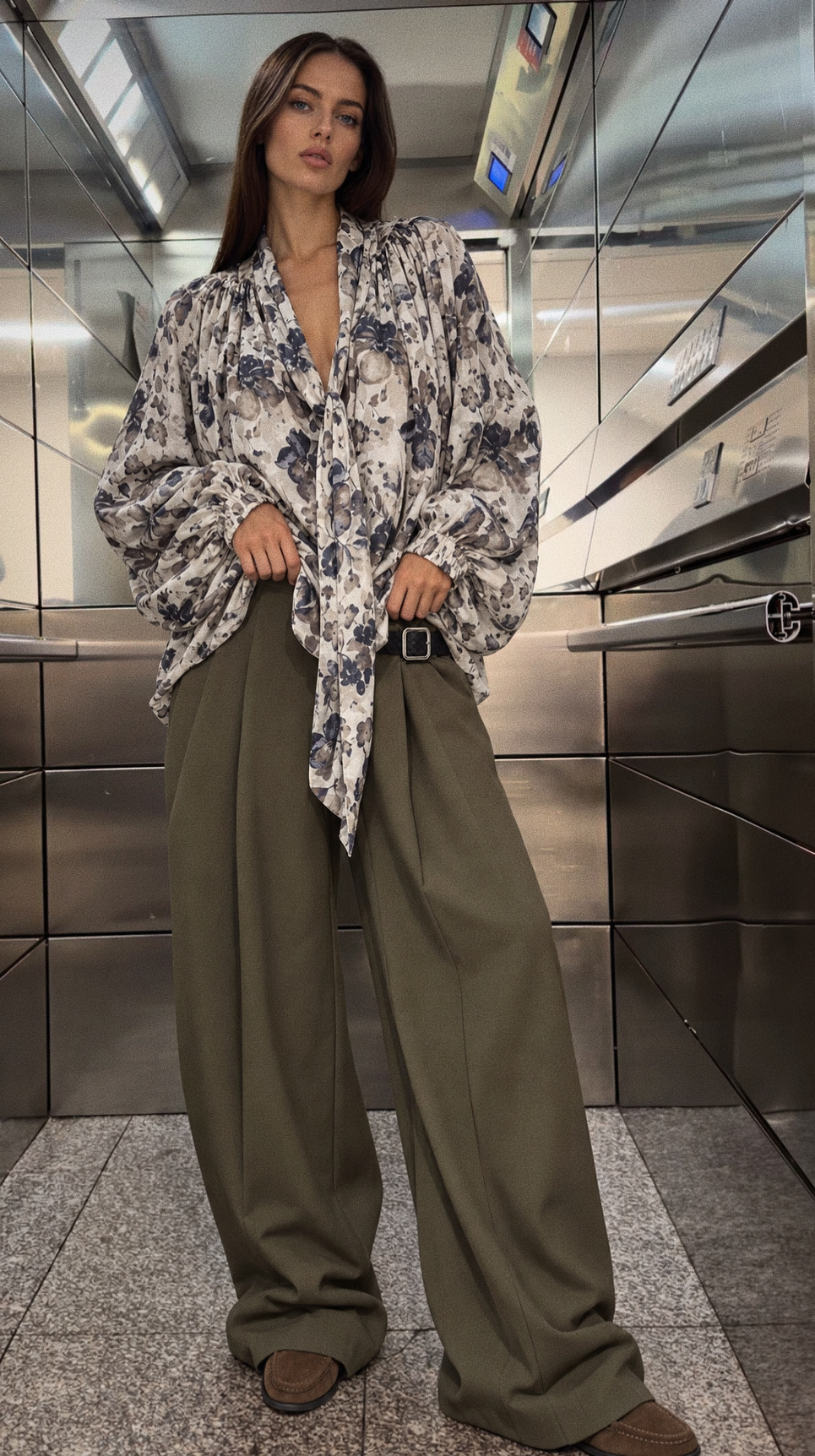 Elongated V‑Neck Blouse