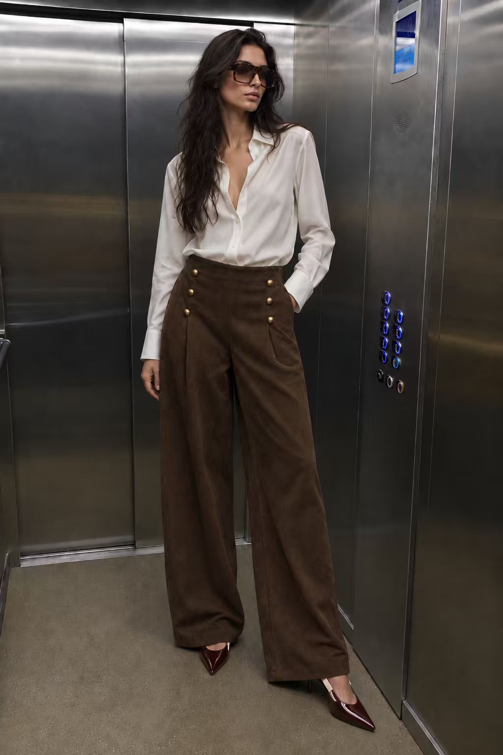 Wide‑Leg Pleated Trousers